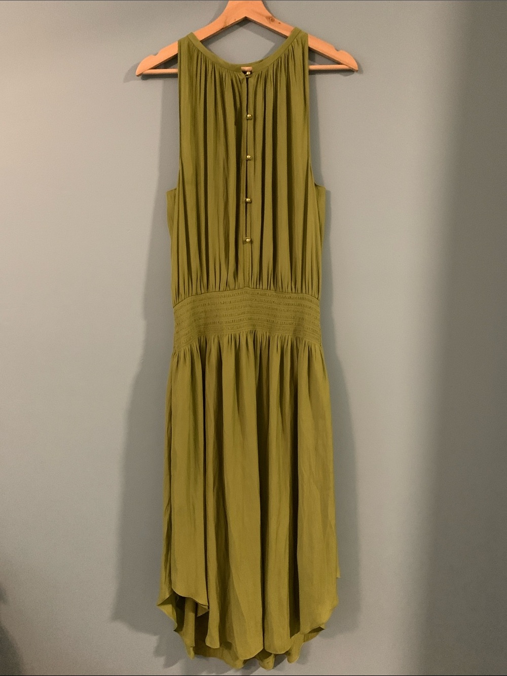 Sleeveless Olive Green Maxi Dress with Smocked Waist and gold button front.